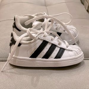 Adidas Allstar shoes.